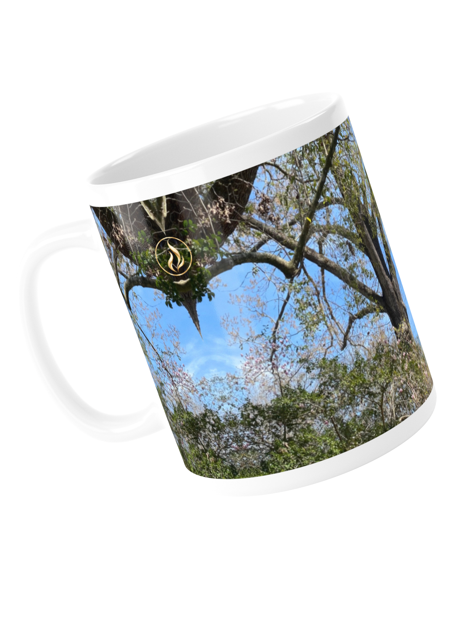 North of East on an eleven-ounce mug, shown tilted with the handle at left and the gold flame visible